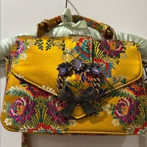 Aldo Floral Embroidered Satin Crossbody Bag in Yellow with Purple Accents